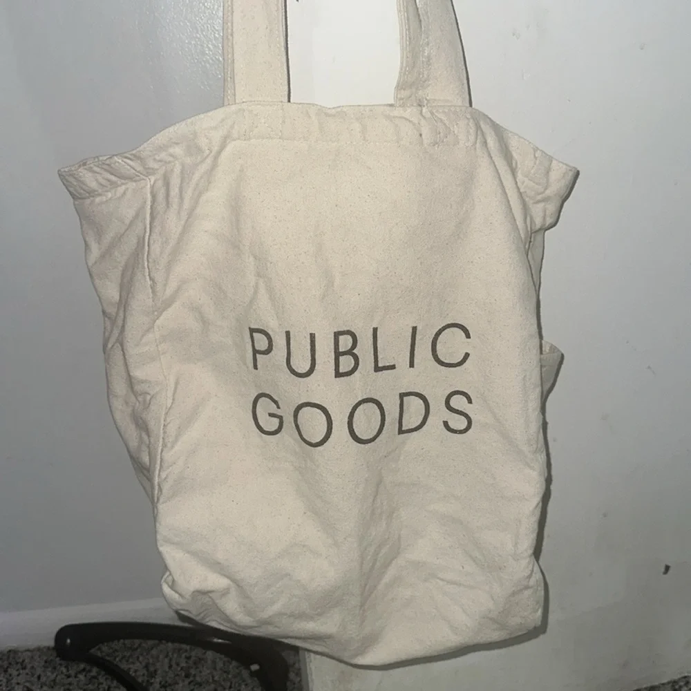 Public Goods Canvas Tote bag. Has 2 inner pockets one zippered, & bottle pocket. - Picture 2 of 4